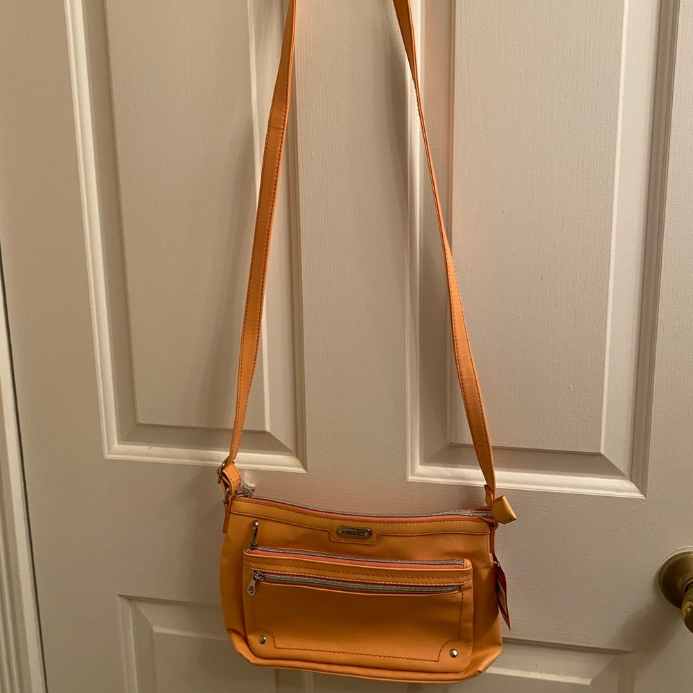 New with tags Relic crossbody bag salmon color